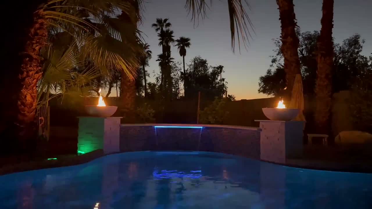 Clean backyard swimming pool serviced by Desert Rose Pool Care